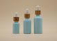 Flessen van de de Hemel de Blauwe 15ml 30ml Etherische olie van de kleurendeklaag met Bamboedruppelbuisje